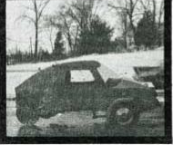 Low-cost, three-wheel economy car (side view).